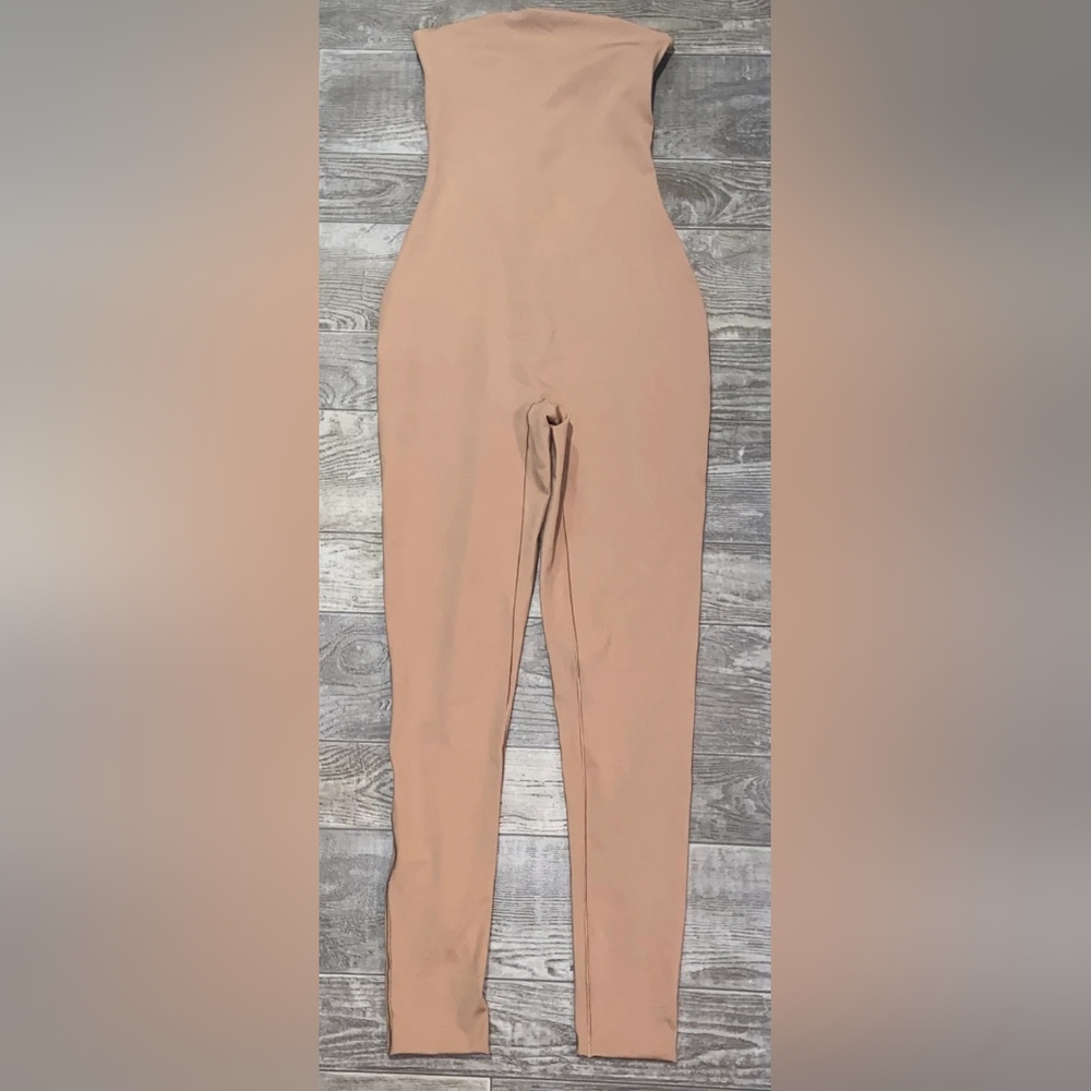 SKIMS All in one strapless catsuit.